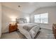 Bedroom with a large window, accent lamps and plush carpet at 522 Trading Post Ln, York, SC 29745