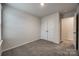 Bedroom features plush carpeting, a double-door closet, and neutral decor at 522 Trading Post Ln, York, SC 29745
