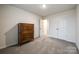 Bedroom with plush carpet, a chest of drawers, and ample closet space at 522 Trading Post Ln, York, SC 29745