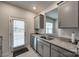 Charming kitchen features granite countertops, stainless steel appliances, and access to the backyard at 522 Trading Post Ln, York, SC 29745