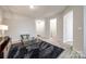 Cozy living room featuring neutral tones, modern furniture, and ample lighting, creating a comfortable and welcoming atmosphere at 522 Trading Post Ln, York, SC 29745