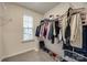 Spacious walk-in closet with shelving and storage, window and plush carpeting at 522 Trading Post Ln, York, SC 29745