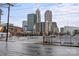 Downtown skyline featuring modern skyscrapers against a cloudy sky at 525 E 6Th St # 211, Charlotte, NC 28202
