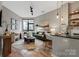 Bright living room with modern decor and hardwood floors at 525 E 6Th St # 211, Charlotte, NC 28202
