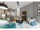 Comfortable living room with open layout to kitchen and bedroom at 525 E 6Th St # 211, Charlotte, NC 28202