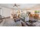 Open-concept living room flowing into kitchen and dining area, perfect for entertaining at 5306 Tilley Manor Dr, Matthews, NC 28105