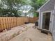 Private back patio with wooden fence and stone pavers, perfect for relaxing at 5963 Moose Ln, Charlotte, NC 28269