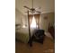 Spacious primary bedroom with a four poster bed frame, dark wood accents, and ceiling fan at 5963 Moose Ln, Charlotte, NC 28269