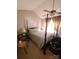 Light filled primary bedroom featuring a four poster bed frame and neutral decor at 5963 Moose Ln, Charlotte, NC 28269
