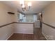 Dining area open to the kitchen, ideal for casual meals and gatherings at 5963 Moose Ln, Charlotte, NC 28269