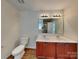 Bright bathroom featuring a double sink vanity and modern lighting at 600 Hunley St, Monroe, NC 28112