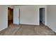 Bedroom features neutral colors, cozy carpet, and a hallway view at 600 Hunley St, Monroe, NC 28112