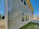 House exterior showcasing siding, windows, and a well-maintained lawn at 600 Hunley St, Monroe, NC 28112