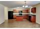 Well-equipped kitchen with stainless appliances and a center island at 600 Hunley St, Monroe, NC 28112