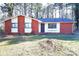 Cozy brick home with a charming front yard and dark trim windows at 6245 Snowcrest Ct, Charlotte, NC 28212