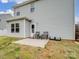 Backyard patio with outdoor seating, perfect for relaxing and entertaining guests with a grassy yard at 629 Gants Rd, York, SC 29745