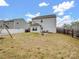 Spacious backyard with fencing, mature trees and a disc golf basket, providing ample privacy and room to play at 629 Gants Rd, York, SC 29745