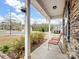 Inviting covered front porch with comfortable seating, perfect for enjoying the neighborhood views and relaxing outdoors at 629 Gants Rd, York, SC 29745