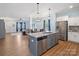 Beautiful open kitchen featuring a granite island, stainless steel appliances, and views to the living room at 629 Gants Rd, York, SC 29745