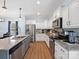 Open kitchen with a central island, stainless steel appliances, and granite countertops at 629 Gants Rd, York, SC 29745