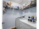 Laundry room features a washing machine, dryer, shelves and other laundry and home cleaning products at 629 Gants Rd, York, SC 29745
