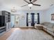 Cozy living room with a comfortable sectional sofa, lots of natural light, and luxury vinyl plank flooring at 629 Gants Rd, York, SC 29745