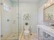 Elegant bathroom featuring a glass enclosed shower, double sink, and decorative mirror at 638 Forest Ln, Rock Hill, SC 29730