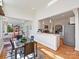 Bright dining area opens to a kitchen with stainless steel appliances and a staircase view at 638 Forest Ln, Rock Hill, SC 29730