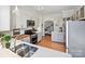 Bright kitchen features stainless steel appliances, light countertops, and sleek white cabinets at 638 Forest Ln, Rock Hill, SC 29730