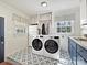 Charming laundry room featuring patterned tile floor and modern appliances at 638 Forest Ln, Rock Hill, SC 29730
