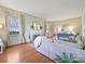 Bright living room with hardwood floors, a fireplace, a plush sofa, and stylish decor at 638 Forest Ln, Rock Hill, SC 29730