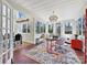 Bright sunroom with views of the dining room and ample natural light at 638 Forest Ln, Rock Hill, SC 29730