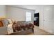 Cozy bedroom featuring neutral tones and ample natural light at 638 Nannyberry Ln, Concord, NC 28025