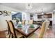Dining area showcasing decor, adjacent to a modern kitchen with stainless steel appliances at 638 Nannyberry Ln, Concord, NC 28025