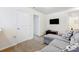 Comfortable bonus room with sofa and tv; great secondary living space at 638 Nannyberry Ln, Concord, NC 28025