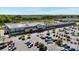 Overhead view of the Publix anchored retail center and full parking lot nestled within a vibrant commercial area at 6450 Keeton Ln, Harrisburg, NC 28075
