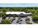 Aerial view of the shopping center and parking, showing its layout and proximity to surrounding amenities at 6450 Keeton Ln, Harrisburg, NC 28075