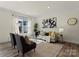 Inviting living room with ample natural light and modern decor at 6450 Keeton Ln, Harrisburg, NC 28075