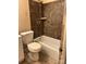 Bathroom featuring standard fixtures and tiled shower at 6520 Farmway Pl, Charlotte, NC 28215