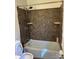 Standard bathroom with a tiled shower and white fixtures at 6520 Farmway Pl, Charlotte, NC 28215