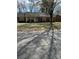 Charming brick home with a well-maintained lawn and mature trees at 6520 Farmway Pl, Charlotte, NC 28215