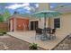 Inviting backyard with a wooden deck, outdoor seating, and lush greenery under a clear sky at 6721 Old Post Rd, Charlotte, NC 28212