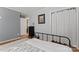 Comfortable bedroom with hardwood floors, neutral walls, and a cozy aesthetic with closet at 6721 Old Post Rd, Charlotte, NC 28212