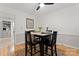 Dining area featuring modern table and chairs with view to the kitchen at 6721 Old Post Rd, Charlotte, NC 28212