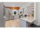 Kitchen area featuring stainless steel appliances, tiled floors and marble counters at 6721 Old Post Rd, Charlotte, NC 28212