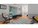 Cozy living room area with natural light, neutral tones and comfortable seating at 6721 Old Post Rd, Charlotte, NC 28212