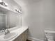 Well-lit bathroom featuring a single sink vanity and shower with neutral decor at 775 Bridgewood Dr, Rock Hill, SC 29732