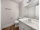 Neutral bathroom with single sink vanity, large mirror, and neutral paint at 775 Bridgewood Dr, Rock Hill, SC 29732