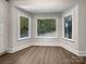 Cozy dining room featuring a bright bay window and hardwood floors at 775 Bridgewood Dr, Rock Hill, SC 29732