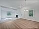 Bright living room with hardwood floors, fireplace, and ample natural light at 775 Bridgewood Dr, Rock Hill, SC 29732